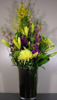 Lilies, forsythia, spider mums ($175)