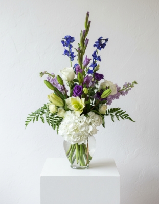 White, blue, purple hydrangea, rose, lily, delphinium