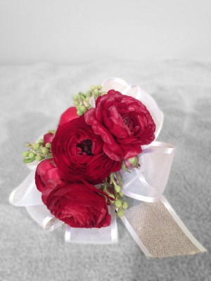 Red ranunculus wrist corsage