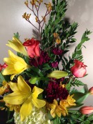 Yellow lilies, hydrangea, roses and kangaroo paws