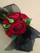 Red rose, black ribbon