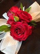Red rose, white ribbon