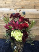 Hydrangea, leucadendron, rose, thistle, dahlia ($65)