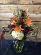 Hydrangea, lily, leucadendron, calla lilies, snapdragon ($75)