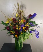 Forsythia, leucadendron, delphinium ($225)