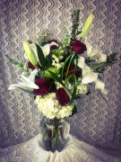 Hydrangea, lily, rose, spider mum, snap dragon ($75)