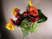 Hydrangea, gerberas, roses and ti leaves