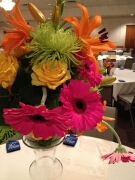 Geberans, roses, lilies, spider mums - tall table arrangment