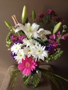 Gerberas, daisies, lilies, and snapdragons