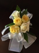White and yellow corsage for prom