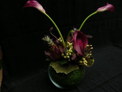 Calla lilies in small globe